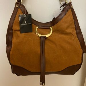 NEW BROWN PURSE. Never used. New with tags